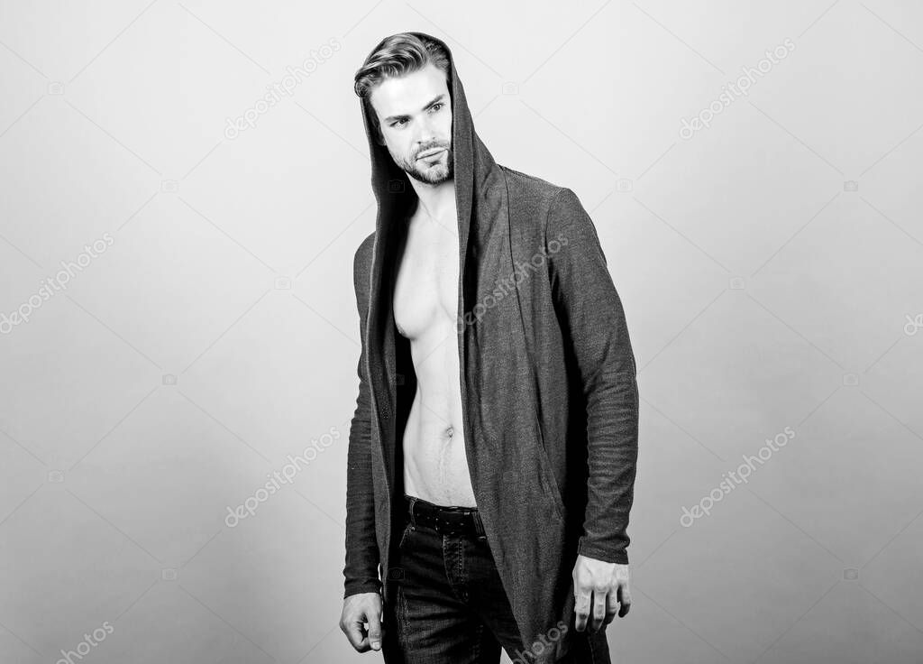 Brute masculinity extremely commanding looking conventionally handsome. Masculinity concept. Masculinity and confidence. Man well groomed handsome hooded clothes. Unconventional but masculine look