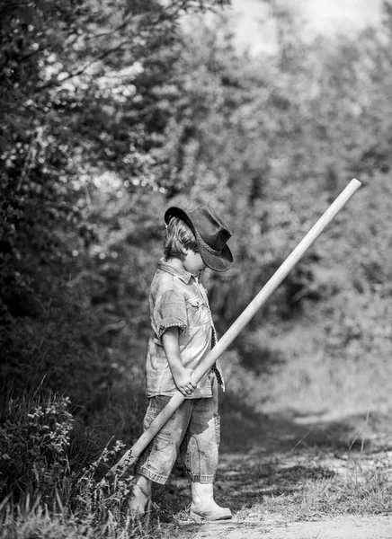 Cute child in nature having fun with shovel. I want to find treasures. Adventure hunting for treasures. Little boy with shovel looking for treasures. Little helper working in garden. Happy childhood — Stock Photo, Image