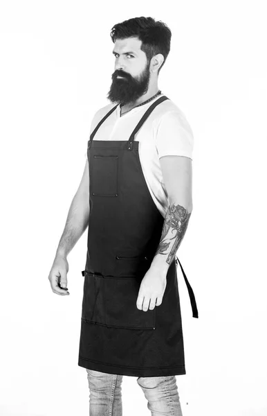 Hipster style. Well groomed macho barber. Barbershop concept. Hairdresser barber salon for men. Man brutal bearded hipster with mustache wear apron uniform. Barbershop staff. Beard grooming salon — Stock Photo, Image