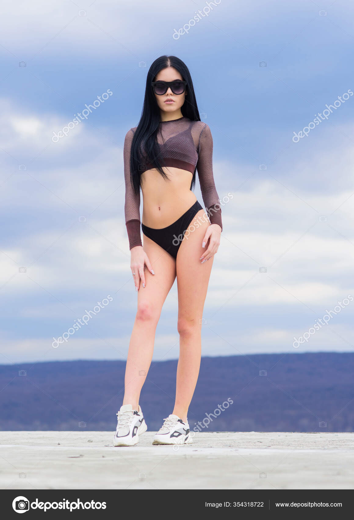 Summer fashion beauty. sexy woman with fit body. freedom. sensual girl in  underwear lingerie and sunglasses outdoor. sport and fitness. Sky. perfect  body with no cellulite and fat. real beauty Stock Photo