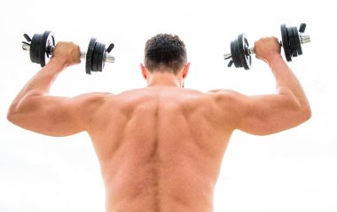 Acı geçicidir, gurur ise sonsuzdur. Kas yığını adam dambıl gibi dikiz aynasıyla egzersiz yapıyor. Sırtı ve kolları güçlü bir sporcu. Spor malzemeleri. Vücut geliştirme sporu. Spor yaşam tarzı. Aptal egzersiz salonu.