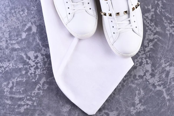 Woman shoes in white color with metal thorns, top view — Stock Photo, Image