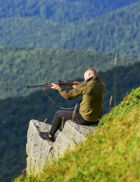 No chances. man ready to fire. hunter hobby. military style. male in camouflage. soldier in the field. polygon. army force. sniper reach target mountain. muscular man hold weapon. purpose and success — Stock Photo, Image