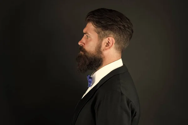 Barbershop concept. Stylist fashion expert. Suit style. Fashion trends for groom. Groom bearded hipster man wear tuxedo and bow tie. Wedding day. Fashion collection. Long beard and mustache — Stock Photo, Image