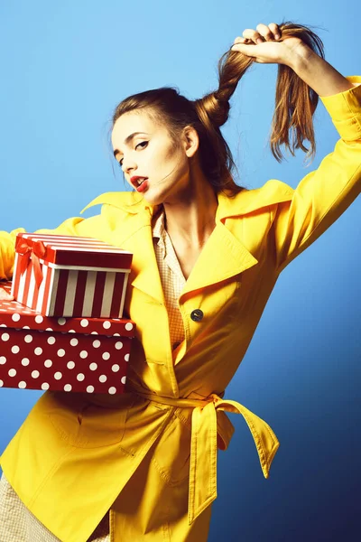 Serious colorful girl with peg — Stock Photo, Image