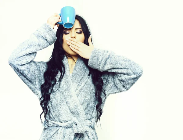 Sexy girl posing in blue velour bathrobe with cup — Stock Photo, Image