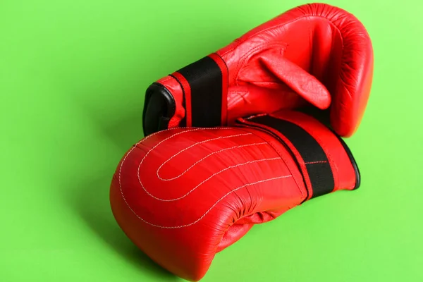 Concept of sports and healthy lifestyle with red boxing gloves — Stock Photo, Image