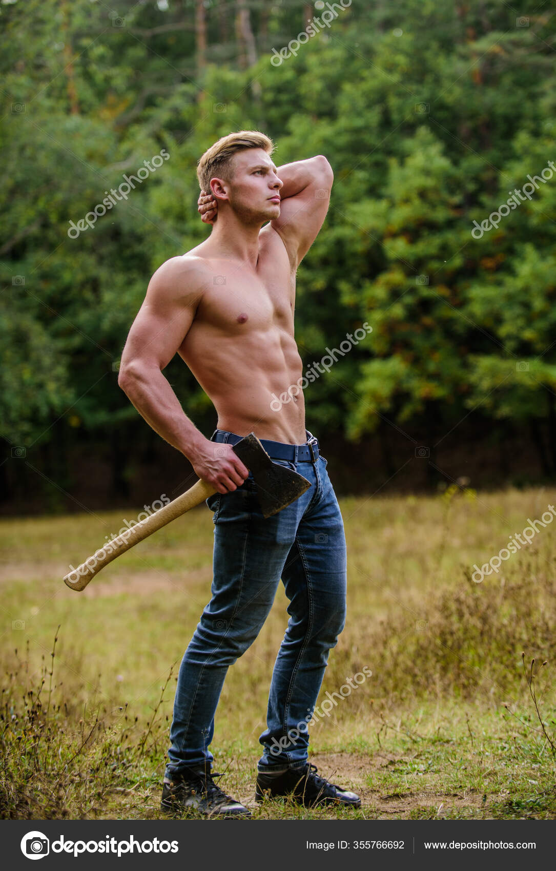 Morning workout. lumberjack carry axe. man strong body. muscular man
