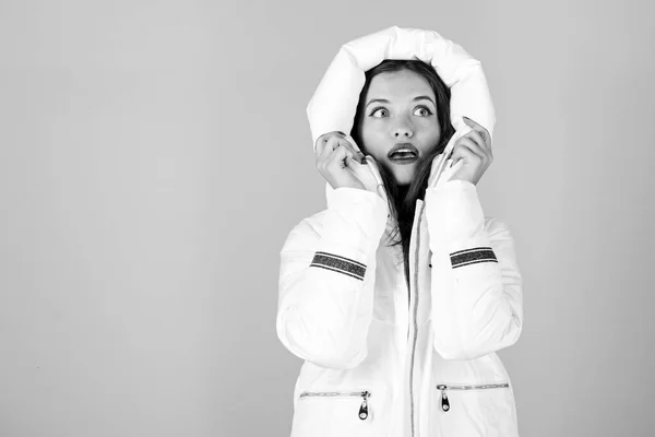 Fancy stylish winter clothes. Not every jacket is ideal for every climate. Girl wear white jacket. Jacket has extra insulation and slightly longer fit to protect your body from sharp winter weather