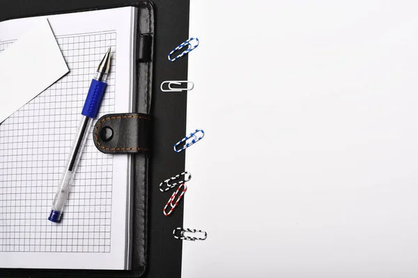 Leather covered notebook with blank pages and paper clips — Stock Photo, Image