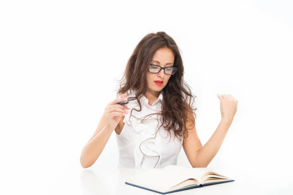 Sexy secretary. working with passion. woman writing at workdesk. paper work with documents. young seductive teacher. sexy woman in glasses. gorgeous brunette girl inspired to work. pass the exam