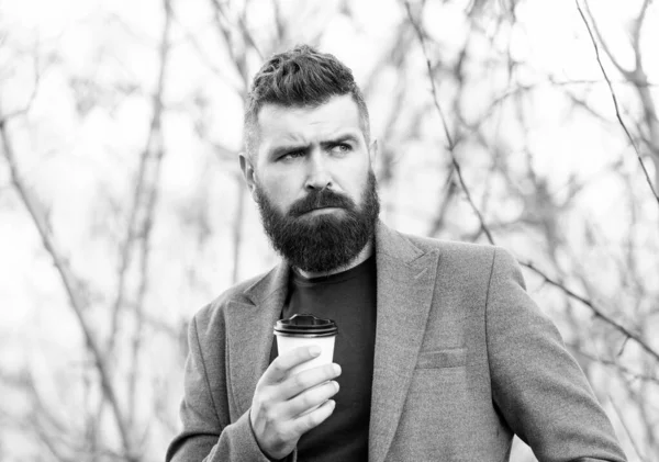 The best time of day to drink coffee. Lawyer hold cup of hot drink outdoor. Bearded man enjoy short drink break. Tasty drink recipe. Refresh yourself — Stock Photo, Image