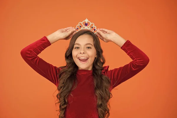 Princess manners. happy girl long curly hair wear crown. little princess live in luxury. queen of beauty. my cherished dream. being elegant lady. best kid fashion. airs and graces. winter carnival