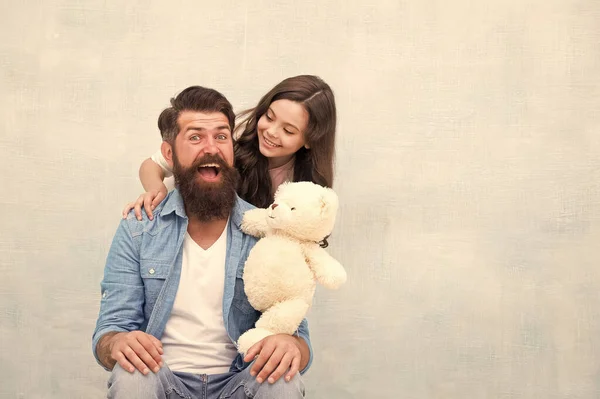 Best friends forever. Father and daughter play with soft toy. Small child and dad enjoy friendship. Happy friends. Playing games. Friends and family. Friends complement each other, copy space — Stock Photo, Image