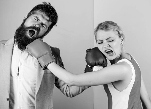Sport for everyone. family couple boxing gloves. bearded man hipster fighting with woman. knockout punching. who is right. win the fight. Strength and power. problems in relationship. sport