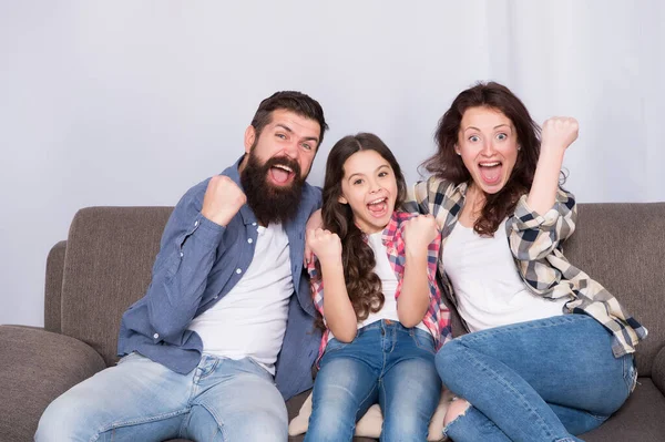 For happiness seek family not fortune. Happy family celebrate victory. Small child and parents make winners gestures. Enjoying happiness. Love and happiness. Trust relations. Family brings happiness — Stock Photo, Image