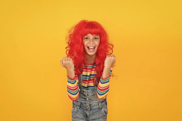 I am ginger and proud of it. Redhead stereotypes. Redheads are not some creatures with magical soul sucking powers. Crazy redhead wig. Messy hairstyle. Kid cheerful smiling happy redhead girl — Stock Photo, Image