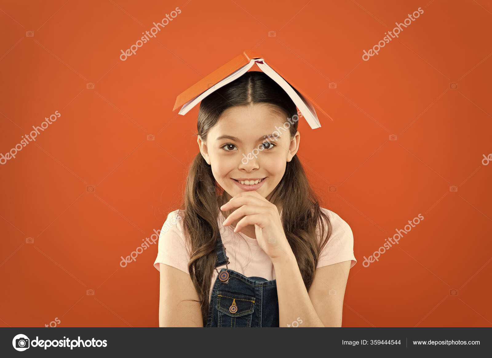Homeschooling concept. poetry and novel. modern education. writing notes.  kid diary. literature lesson. back to school. happy little girl with  notebook. school girl read book on orange background Stock Photo by ©stetsik
