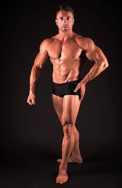 Perfect shape. Bodybuilder concept. Bodybuilder man with strong body. Bodybuilder with six pack and ab muscle. Sexy bodybuilder with muscular torso. Bodybuilding sport. Power of muscles concept — 스톡 사진