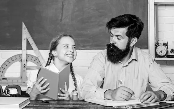 Lesson is finished. Discipline upbringing. Man bearded pedagogue study together with kid. Study is fun. School teacher and schoolgirl. Task successfully done. Homeschooling with father. Help study — Stock Photo, Image