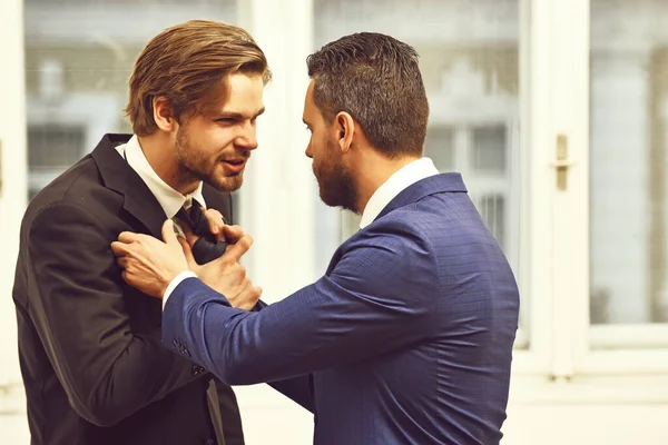 Fight, business conflict, confident men or businessmen fight with tie — Stock Photo, Image