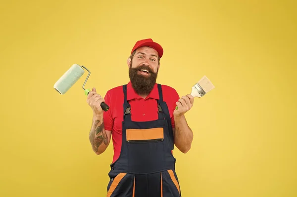 Engineer worker career. Hard worker with painting brush and roller. Construction worker ready to work. brutal hipster try to be craftsman. professional repairer. serious builder man. bearded worker — 스톡 사진