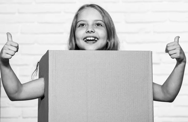 Rent house. Real estate. Kid moving out. Moving routine. Prepare for moving. Make moving easier. Girl small child carry cardboard box. Packaging things. Move out concept. Delivering your purchase — Stock Photo, Image