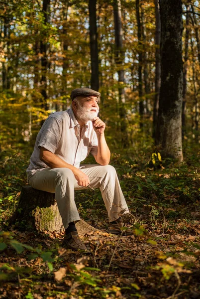 Fresh air. Idyllic moments. Grandpa vintage outfit in nature. Elderly people care. Nursing home. True values. Meaning of life. Nature is calling. Pensioner relax autumn nature. Natural environment