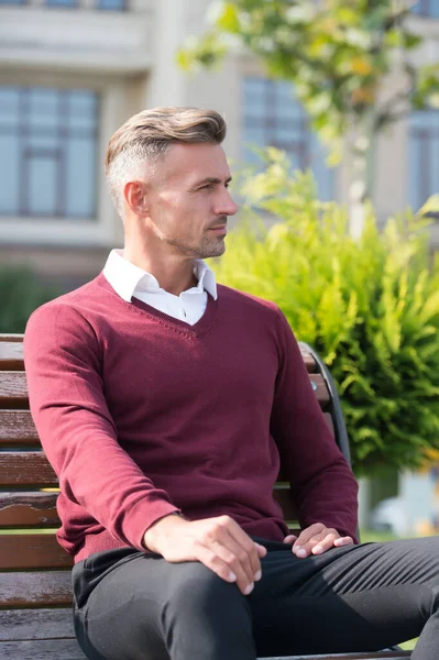 Lunch break. Time for yourself. Man in formal clothes outfit relax sit bench in park. Businessman formal clothing manager need time to relax. Pleasant moments of entrepreneurship. Waiting concept