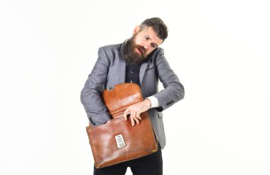 Yetişkin İşadamı Çanta Dengeleme ve Cep Telefonu Kullanımı.