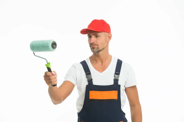 Interesse an Design und Dekoration. Innenausstatter isoliert auf weiß. Maler Dekorateur halten Farbwalze. Geschickter Dekorateur oder Handwerker. Maler- und Dekorationsarbeiten. Hausdekorateur — Stockfoto