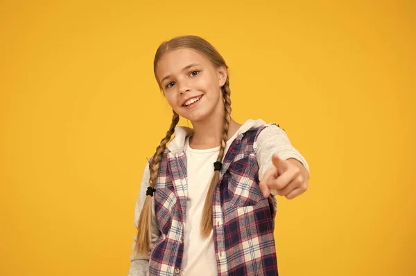 Self confidence. Cute braided girl. Kid long hair. Small girl checkered shirt. Happy international childrens day. Casual style. Little girl yellow background. Good mood concept. Positive vibes — Stock Photo, Image