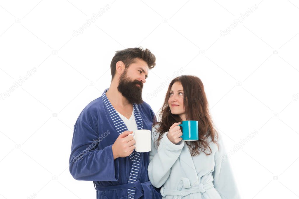 Batch brew is pour over coffee created using machine assistance. Brewing specialty coffee easy. Couple in domestic clothes enjoy morning coffee. Man and woman bathrobes drink coffee. Cozy moments