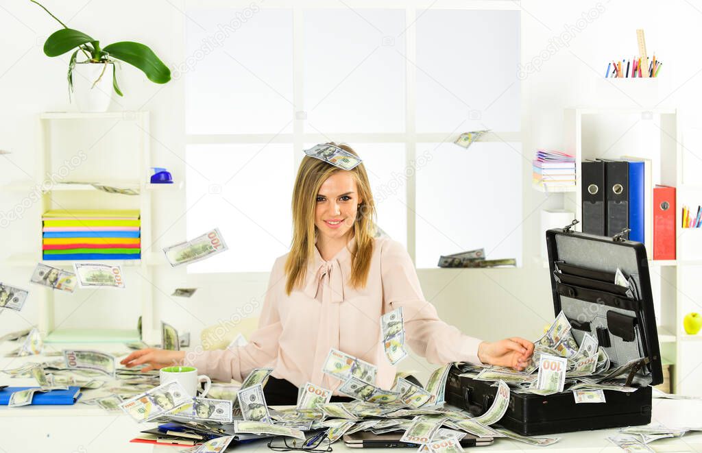 Financial expert. Finances is my passion. Girl with briefcase full of cash. Financial achievement. Business challenge. Accounting and banking. Smart blonde earn lot of money. Financial success