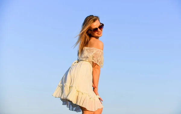 Impulsiveness and ease. Naturalness concept. Dancing woman. Mental health. Emotional girl. Happy girl white dress feel free. Summer party. Sunny day. Carefree girl. Freedom. Girl blue sky background — Stock Photo, Image