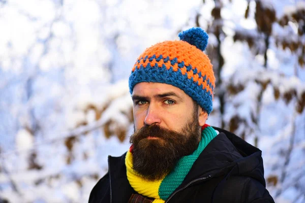 Man with colorful knitted hat and scarf. — Stock Photo, Image