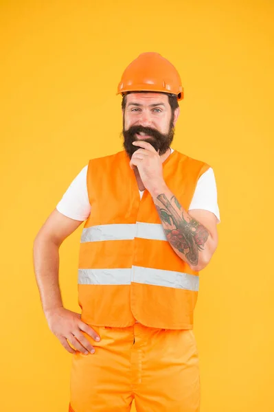 I love constructing. Construction worker yellow background. Construction engineer or builder in work uniform. Building and construction industry. Engineering and design. Construction safety — Stock Photo, Image
