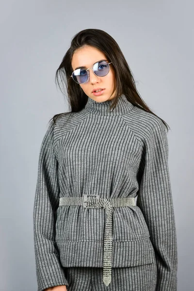 Feel comfortable. Woman wear grey suit blouse and pants. Shop Your Style. Fashionable knitwear. Designed for your comfort. Warm comfortable clothes. Casual style for every day. Knitwear concept