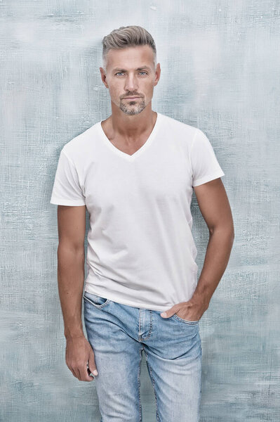 Handsome hipster. Simple and comfy. Quality Clothing Made To Last. Style and versatility of quality tshirt. Summer fashion. Mature man casual outfit. Fashion model. Menswear concept. Fashion clothes