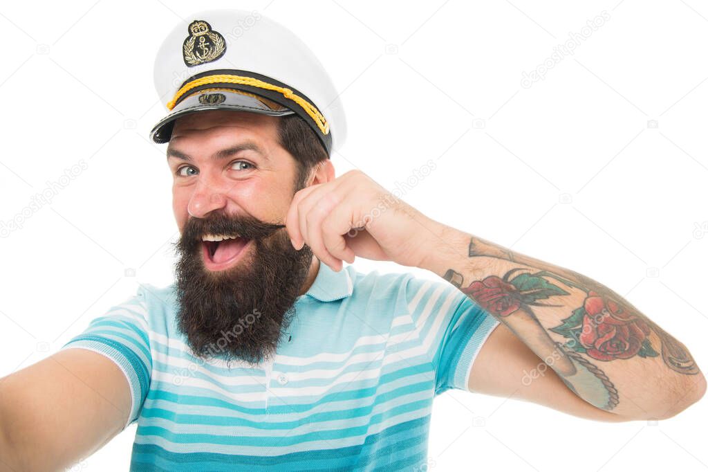 Funny sailor with cap and shirt. navy day. tourist on summer vacation. bearded man in captain cap has moustache. brutal man in sailor hat. summer marine male fashion. concept of tourism