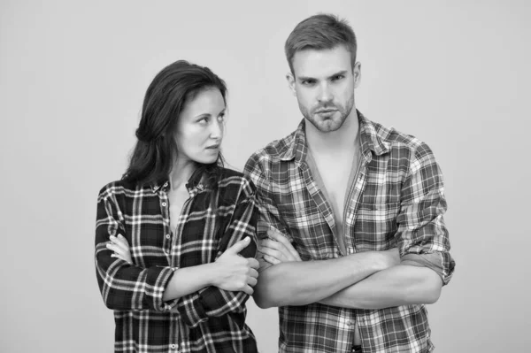 Problems in relationship. couple break up. family psychology. man and woman checkered shirt. serious students yellow background. lets talk. misunderstanding in relations. this is conflict crisis — 스톡 사진