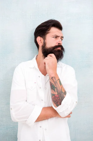 Thinking about style. Summer fashion. Bearded model casual outfit. Fashion model. Mature handsome hipster with beard wear white shirt. Menswear concept. Fashion clothes. Attractive man with mustache