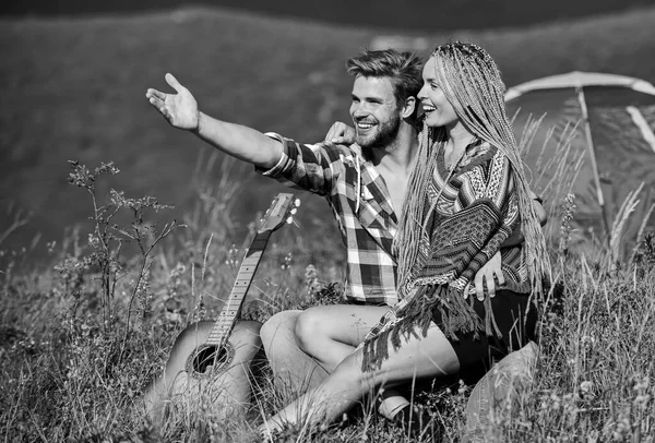 Love concept. Camping vacation. Camping in mountains. Family travel. Hiking romance. Summer vacation. Boyfriend girlfriend guitar near camping tent. Couple in love happy relaxing nature background — Stock Photo, Image
