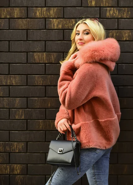 Pink sheepskin coat. Fancy chic coat. Natural wool sheepskin coat. Fur on hood. Stay warm and fashionable. Glamorous lady. Woman wear furry coat. Winter clothes. Fashion as unique as you are — Stock Photo, Image