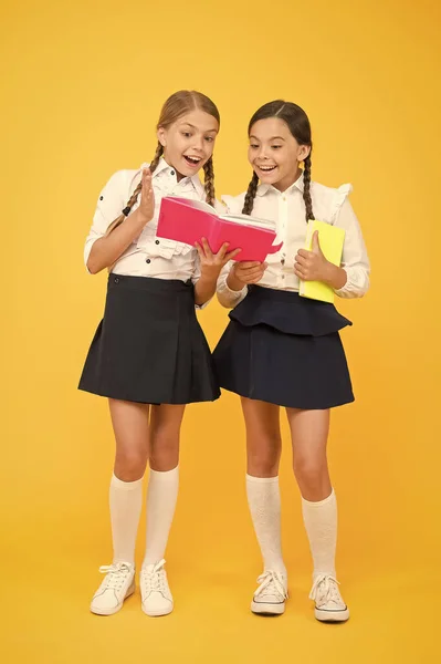 Sharing gossips personal diary. School friendship. Most important thing one learns in school is self esteem support and friendship. Friendship goals. Cute school girls with books. First day at school — Stock Photo, Image