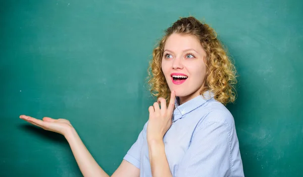 Woman teacher in front of chalkboard. Teacher explain hard topic. Important information to remember. Teacher friend of learners. Better than thousand days diligent study is one day with great teacher