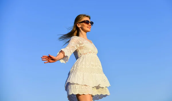 Freedom. Impulsiveness and ease. Naturalness concept. Dancing woman. Mental health. Girl blue sky background. Emotional girl. Happy girl white dress feel free. Summer party. Sunny day. Carefree girl — Stock Photo, Image