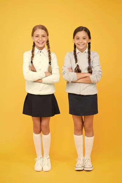 Cheerful mood concept. School friendship. Support and friendship. Problem relations. Friendly relationship. Friendship goals. Cute school girls classmates. First school day. Sisterhood and friendship — Stock Photo, Image