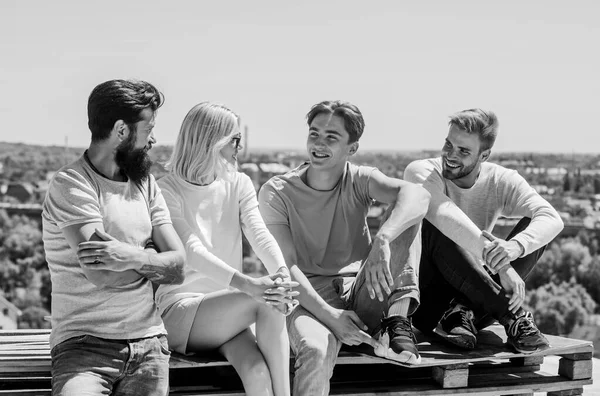 Family is Best. Group of people in casual wear. diverse young people talking together. happy men and girl relax. best friends. Summer vacation. group of four people. great fit for day off