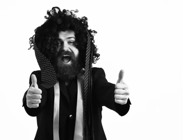 Caucasian hipster in suit and black curly wig — Stock Photo, Image